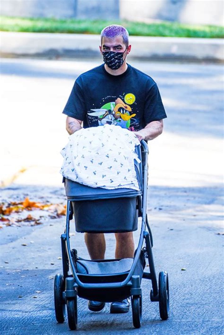 Joe Jonas Is The Ultimate Doting Dad On Solo Stroll With Newborn Daughter Willa — Pic